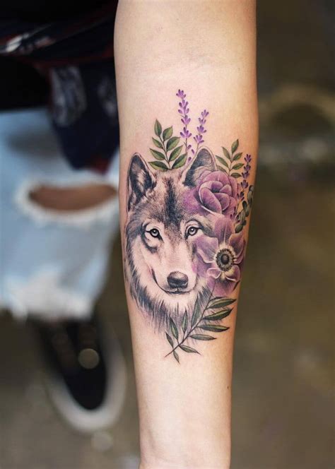 wolf in woods tattoo|wolf tattoos for females.